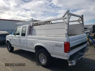 1992 Ford F-150 with VIN 1FTEX14N3NKB14423, listed as a Copart auction lot 77404624 with 287,507 mi miles and Salvage Title. Bid and sale history available at carsss.com. Image 2.