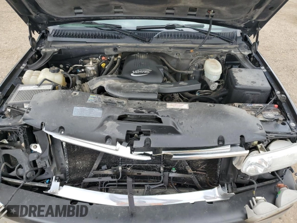 2003 Chevrolet Tahoe LS with VIN 1GNEK13ZX3J311862, listed as a Copart auction lot 54872545 with 198,579 mi miles and Salvage Title. Bid and sale history available at DreamBid. Image 12.