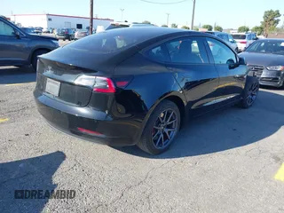 2018 Tesla Model 3 Long Range Battery with VIN 5YJ3E1EA5JF171948, listed as a IAAI auction lot 41993887 with 42,370 mi miles and . Bid and sale history available at DreamBid. Image 4.