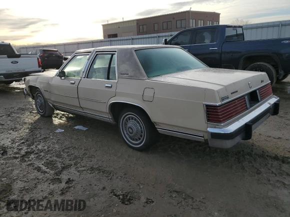 1987 Mercury Grand Marquis GS z VIN 2MEBM74F9HX714211, wystawiony jako Copart lot #43594205 z przebiegiem 26 933 mil mil oraz Szkody całkowita. Historia ofert i sprzedaży dostępna na DreamBid. Obrazek 2.