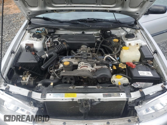 1998 Subaru Legacy L with VIN 4S3BK435XW6316402, listed as a Copart auction lot 60301805 with 288,744 mi miles and Salvage title. Bid and sale history available at DreamBid. Image 12.