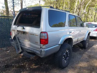 2000 Toyota 4Runner Limited z VIN JT3HN87R6Y9037203, wystawiony jako IAAI lot #42048560 z przebiegiem 245 375 mil mil oraz . Historia ofert i sprzedaży dostępna na DreamBid. Obrazek 4.