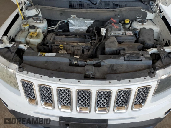 2016 Jeep Compass Latitude z VIN 1C4NJCEAXGD633548, wystawiony jako Copart lot #59866875 z przebiegiem 193 695 mil mil oraz Szkoda całkowita • Salvage title. Historia ofert i sprzedaży dostępna na DreamBid. Obrazek 12.
