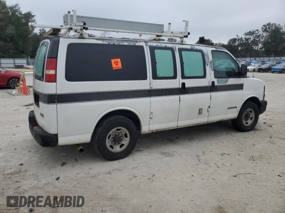 2003 GMC Savana Cargo z VIN 1GTHG35U831199213, wystawiony jako Copart lot #86549414 z przebiegiem Nie podano mil oraz Szkody całkowita. Historia ofert i sprzedaży dostępna na DreamBid. Obrazek 3.
