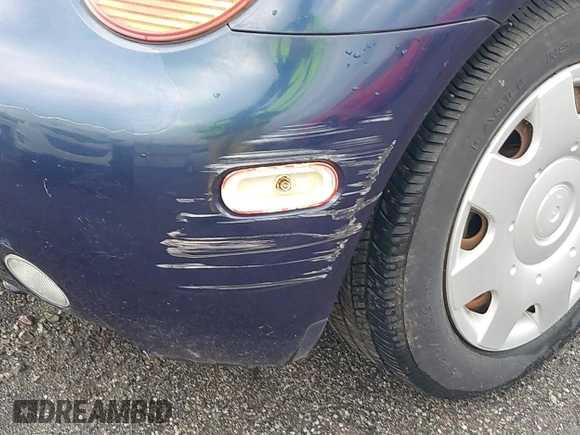 1999 Volkswagen Beetle GLS with VIN 3VWCA21C9XM417149, listed as a IAAI auction lot 41690669 with 147,897 mi miles and . Bid and sale history available at DreamBid. Image 6.