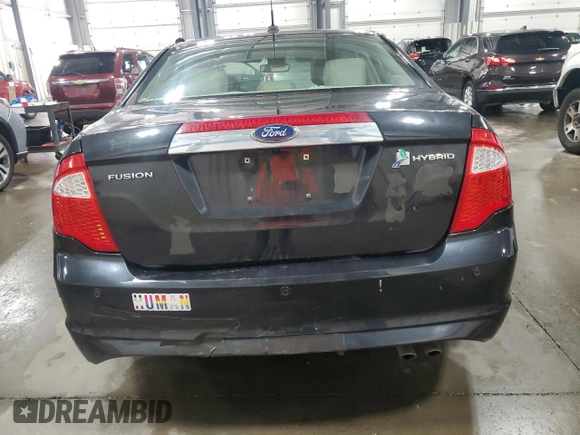2012 Ford Fusion Hybrid с VIN 3FADP0L33CR231536, выставлен на аукционе Copart как лот 55330545 с пробегом 165 481 миль миль и Списание • Salvage title. История ставок и продаж доступна на DreamBid. Изображение 6.