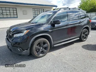 2019 Honda Passport Elite z VIN 5FNYF8H06KB003641, wystawiony jako Copart lot #58218825 z przebiegiem 139 616 mil mil oraz Szkoda całkowita • Salvage title. Historia ofert i sprzedaży dostępna na DreamBid. Obrazek 1.