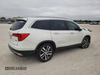 2017 Honda Pilot Touring with VIN 5FNYF5H95HB015365, listed as a Copart auction lot 52371205 with 153,141 mi miles and Salvage title. Bid and sale history available at DreamBid. Image 3.