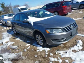 2014 Volkswagen Passat Wolfsburg Ed with VIN 1VWAS7A38EC103315, listed as a IAAI auction lot 41604916 with 144,267 mi miles. Bid and sale history available at carsss.com. Image 1.