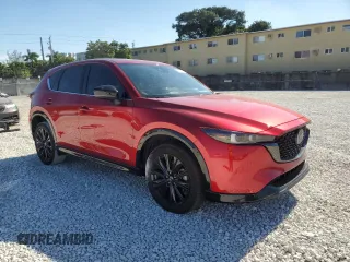 2022 Mazda CX-5 2.5 Turbo with VIN JM3KFBAY9N0560069, listed as a Copart auction lot 84155024 with 36,352 mi miles and Salvage Title. Bid and sale history available at carsss.com. Image 4.