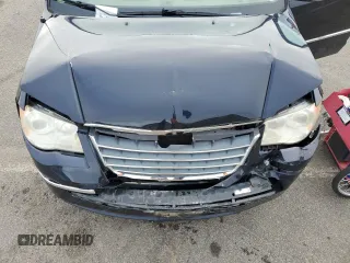 2010 Chrysler Town & Country Limited with VIN 2A4RR7DX5AR301202, listed as a Copart auction lot 67318254 with 113,740 mi miles and Salvage Title. Bid and sale history available at DreamBid. Image 14.
