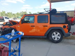 2018 Jeep Wrangler Unlimited Sport z VIN 1C4HJXDN4JW243775, wystawiony jako IAAI lot #41791821 z przebiegiem 62 120 mil mil oraz . Historia ofert i sprzedaży dostępna na DreamBid. Obrazek 15.