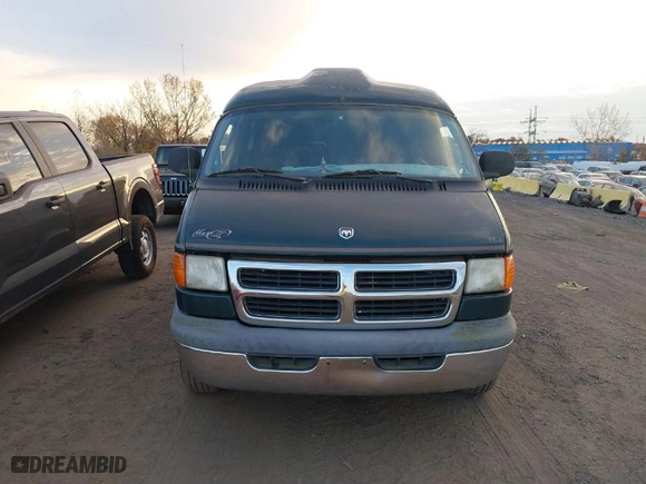 1999 Dodge Ram Van Conversion with VIN 2B6HB11Y8XK546999, listed as a IAAI auction lot 40672821 with NaN miles. Bid and sale history available at carsss.com. Image 12.