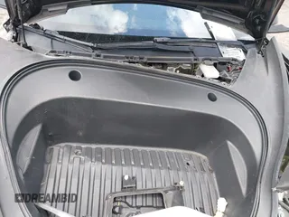 2022 Tesla Model 3 with VIN 5YJ3E1EA3NF287512, listed as a IAAI auction lot 42000557 with 77,619 mi miles. Bid and sale history available at carsss.com. Image 10.