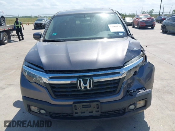 2019 Honda Ridgeline RTL with VIN 5FPYK2F59KB004653, listed as a IAAI auction lot 42066778 with 90,144 mi miles and . Bid and sale history available at DreamBid. Image 12.