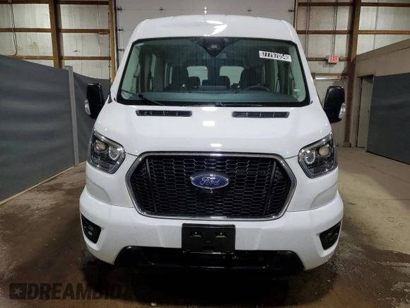 2023 Ford Transit Passenger XL with VIN 1FBAX2C81PKB30711, listed as a Copart auction lot 77797054 with 18,161 mi miles and Clean Title. Bid and sale history available at DreamBid. Image 5.