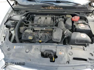 2013 Ford Taurus SEL with VIN 1FAHP2E81DG159721, listed as a Copart auction lot 52616535 with 136,677 mi miles and Salvage Title. Bid and sale history available at carsss.com. Image 11.