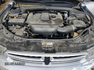 2017 Dodge Durango GT z VIN 1C4RDHDG6HC634599, wystawiony jako Copart lot #54945475 z przebiegiem 165 609 mil mil oraz Szkoda całkowita • Salvage title. Historia ofert i sprzedaży dostępna na DreamBid. Obrazek 12.