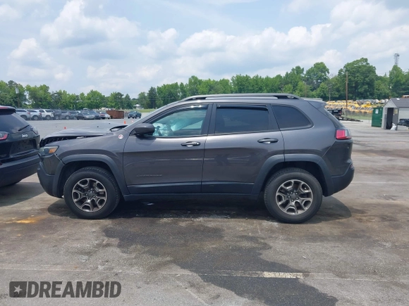 2020 Jeep Cherokee Trailhawk with VIN 1C4PJMBX5LD530720, listed as a IAAI auction lot 42404948 with 99,606 mi miles and . Bid and sale history available at DreamBid. Image 14.