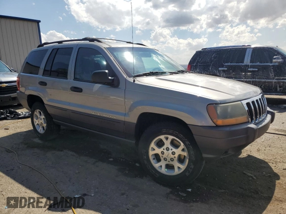 2001 Jeep Grand Cherokee Laredo with VIN 1J4GW48S91C580921, listed as a Copart auction lot 59005625 with 163,827 mi miles and Salvage title. Bid and sale history available at DreamBid. Image 4.