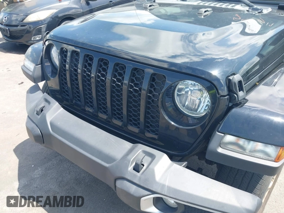 2023 Jeep Gladiator Sport S with VIN 1C6HJTAGXPL543319, listed as a IAAI auction lot 42499587 with 45,140 mi miles and . Bid and sale history available at DreamBid. Image 6.