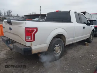 2017 Ford F-150 XL with VIN 1FTEX1CF3HKE56758, listed as a IAAI auction lot 41558163 with 144,380 mi miles. Bid and sale history available at carsss.com. Image 4.