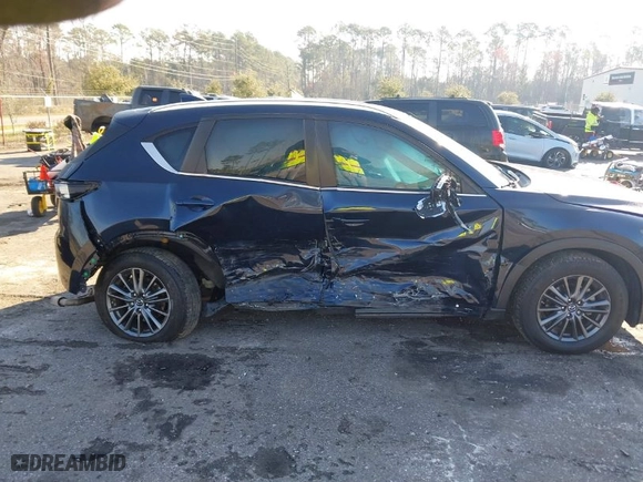 2019 Mazda CX-5 Touring with VIN JM3KFACM5K1608354, listed as a IAAI auction lot 41675828 with NaN miles. Bid and sale history available at carsss.com. Image 13.