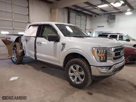 2021 Ford F-150 XL with VIN 1FTFW1E89MKD93309, listed as a IAAI auction lot 41413599 with 77,647 mi miles. Bid and sale history available at carsss.com. Image 1.