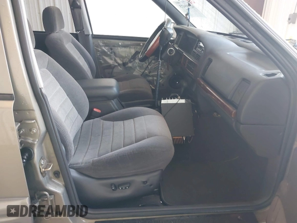 1998 Jeep Grand Cherokee Laredo with VIN 1J4GZ48S4WC262249, listed as a IAAI auction lot 42739473 with 94,094 mi miles and . Bid and sale history available at DreamBid. Image 5.