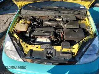2000 Ford Focus ZX3 with VIN 3FAHP3131YR213601, listed as a Copart auction lot 88597525 with 134,724 mi miles and Salvage title. Bid and sale history available at DreamBid. Image 11.