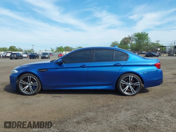 2013 BMW M5 with VIN WBSFV9C56DC774032, listed as a IAAI auction lot 42124754 with 55,409 mi miles. Bid and sale history available at carsss.com. Image 14.