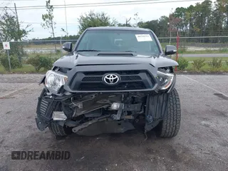 2014 Toyota Tacoma with VIN 5TFLU4EN9EX099414, listed as a IAAI auction lot 40528514 with 122,827 mi miles. Bid and sale history available at carsss.com. Image 11.