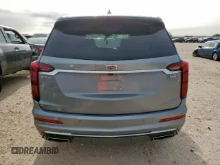 2024 Cadillac XT6 FWD Luxury with VIN 1GYKPAR41RZ700452, listed as a Copart auction lot 57675945 with 27,449 mi miles and Salvage title. Bid and sale history available at DreamBid. Image 6.