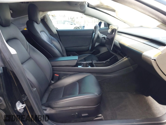 2019 Tesla Model 3 Mid Range with VIN 5YJ3E1EA1KF410297, listed as a IAAI auction lot 41841991 with 176,254 mi miles. Bid and sale history available at carsss.com. Image 5.