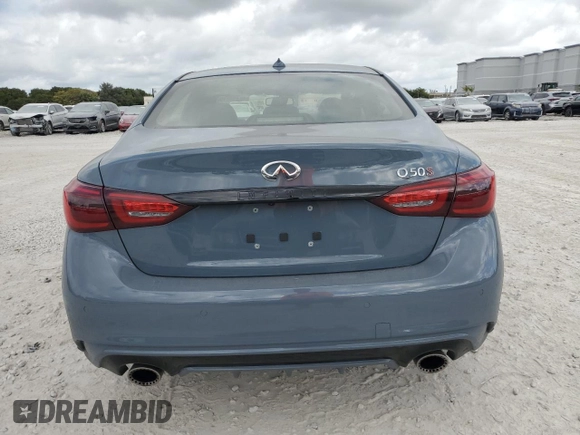 2024 Infiniti Q50 Red Sport 400 with VIN JN1FV7DP0RM660155, listed as a Copart auction lot 44143915 with 5,521 mi miles and Salvage Title. Bid and sale history available at DreamBid. Image 6.