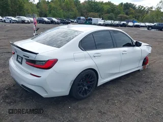 2021 BMW 3 Series M340i xDrive with VIN 3MW5U9J01M8B89618, listed as a IAAI auction lot 40473458 with 58,438 mi miles. Bid and sale history available at carsss.com. Image 4.
