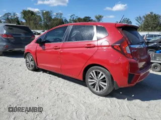 2015 Honda Fit EX-L with VIN 3HGGK5H83FM771673, listed as a Copart auction lot 76297004 with 186,736 mi miles and Salvage Title. Bid and sale history available at DreamBid. Image 2.