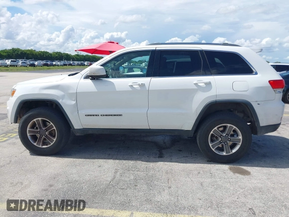 2014 Jeep Grand Cherokee Limited with VIN 1C4RJFBG5EC132159, listed as a IAAI auction lot 42604916 with 248,954 mi miles and . Bid and sale history available at DreamBid. Image 14.