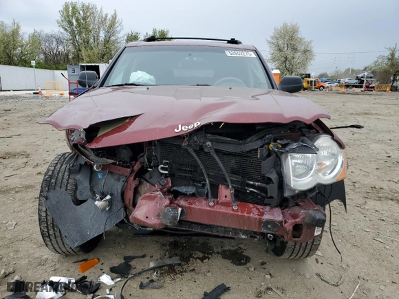 2008 Jeep Grand Cherokee Laredo with VIN 1J8GR48K68C240142, listed as a Copart auction lot 52652275 with 185,437 mi miles and Salvage Title. Bid and sale history available at carsss.com. Image 5.