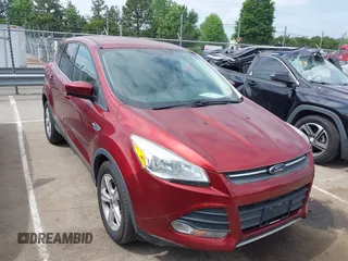 2014 Ford Escape SE with VIN 1FMCU0GX4EUD02407, listed as a IAAI auction lot 42156731 with 114,117 mi miles. Bid and sale history available at carsss.com. Image 1.