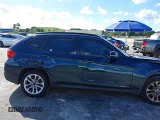 2015 BMW X1 xDrive28i z VIN WBAVL1C57FVY30820, wystawiony jako IAAI lot #40693352 z przebiegiem 111 221 mil mil oraz . Historia ofert i sprzedaży dostępna na DreamBid. Obrazek 12.