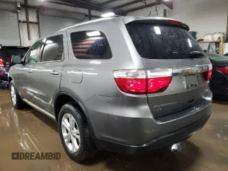 2012 Dodge Durango Crew with VIN 1C4RDJDG1CC100717, listed as a Copart auction lot 47446365 with 103,539 mi miles and Salvage Title. Bid and sale history available at carsss.com. Image 2.