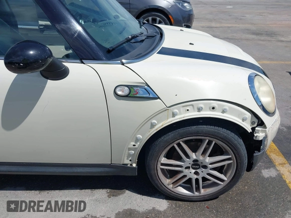 2007 MINI Hardtop S with VIN WMWMF73567TL89619, listed as a IAAI auction lot 42807828 with 201,371 mi miles and . Bid and sale history available at DreamBid. Image 6.