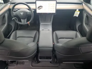 2023 Tesla Model Y Long Range with VIN 7SAYGDEE0PF746778, listed as a Copart auction lot 52704965 with 19,047 mi miles and Salvage Title. Bid and sale history available at DreamBid. Image 8.