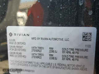 2022 Rivian R1S Launch Edition with VIN 7PDSGABL6NN001531, listed as a Copart auction lot 77143684 with 27,241 mi miles and Salvage Title. Bid and sale history available at carsss.com. Image 13.