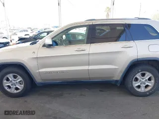 2014 Jeep Grand Cherokee Laredo with VIN 1C4RJFAG7EC380544, listed as a IAAI auction lot 42021130 with 166,589 mi miles. Bid and sale history available at carsss.com. Image 14.