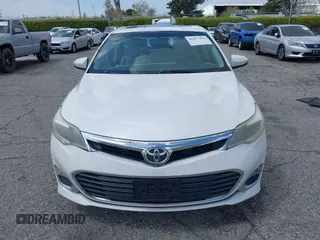 2014 Toyota Avalon Limited z VIN 4T1BK1EB1EU117097, wystawiony jako IAAI lot #41937996 z przebiegiem 169 336 mil mil oraz . Historia ofert i sprzedaży dostępna na DreamBid. Obrazek 12.