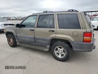 1998 Jeep Grand Cherokee Laredo with VIN 1J4FX58S0WC337066, listed as a Copart auction lot 69125414 with 0 mi miles and Salvage Title. Bid and sale history available at carsss.com. Image 2.