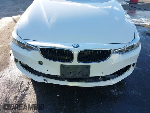 2014 BMW 4 Series 428i with VIN WBA3N7C50EF718812, listed as a IAAI auction lot 41349128 with 67,581 mi miles and . Bid and sale history available at carsss.com. Image 12.