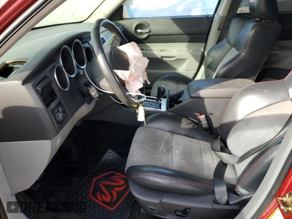 2006 Dodge Charger SRT-8 with VIN 2B3KA73W66H283699, listed as a Copart auction lot 44060975 with 126,105 mi miles and Salvage Title. Bid and sale history available at DreamBid. Image 7.